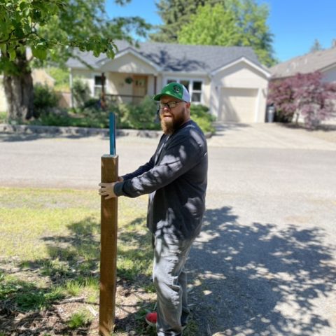 Allen Johnston working on a fence.